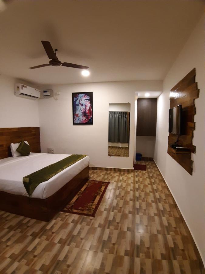 Treebo Lands End Beach Resort Морджим Экстерьер фото